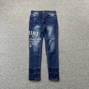 AMIRI Embroidered Logo Ripped Blue Jeans
